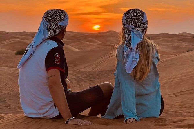 Desert Safari with BBQ Dinner, Camel Ride, Sand Board & Live Show - Camel Ride, Sandboarding, and Camp Traditions