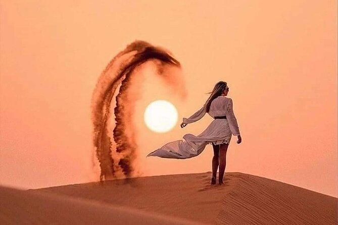 Desert Safari With BBQ Dinner, Camel Ride, Sand Boarding In Dubai - Fire, Tanoura, and belly-dance entertainment