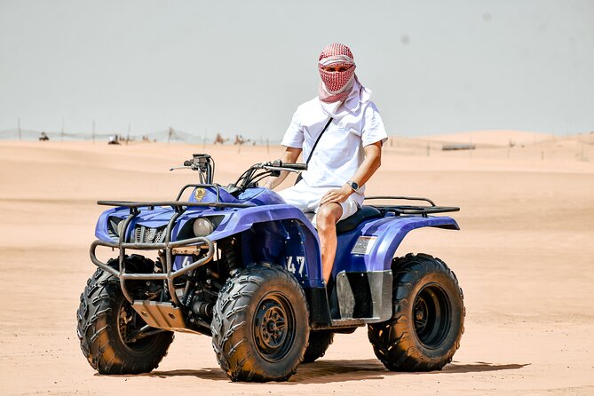 Desert Safari With BBQ Dinner, Quad Bike & Camel Ride from Dubai - Pickup from Dubai and the ride to Lahbab