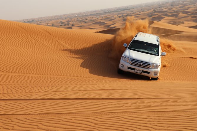 Desert Safari with BBQ Dinner (Sharing/Private) - Sunset turns the desert into the evening’s best photo stop