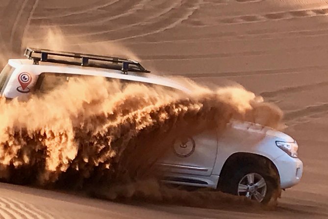 Desert Safari with BBQ Dinner - UAE Must Do - The Desert Opens Up Beyond the City