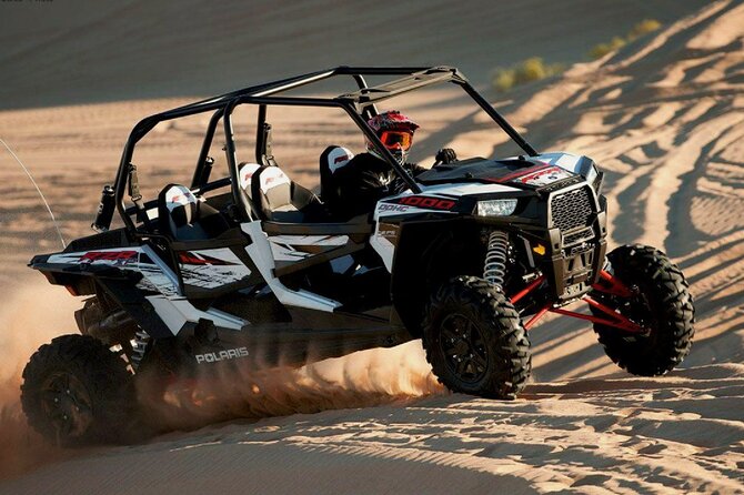 Desert Safari with Dune Bashing and Dinner In Dubai - Camel riding and Bedouin-style camp activities