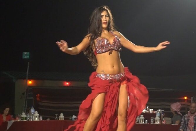 Desert Safari with Quad Bike Ride in Red Dunes - Al Aweer camp brings dinner and four shows