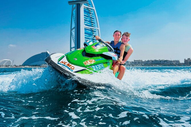 Dubai: 30min Jet Ski: Burj Al Arab w Pics, Videos, free Ice Cream - Cruising past the Burj Al Arab and Jumeirah Beach Hotel