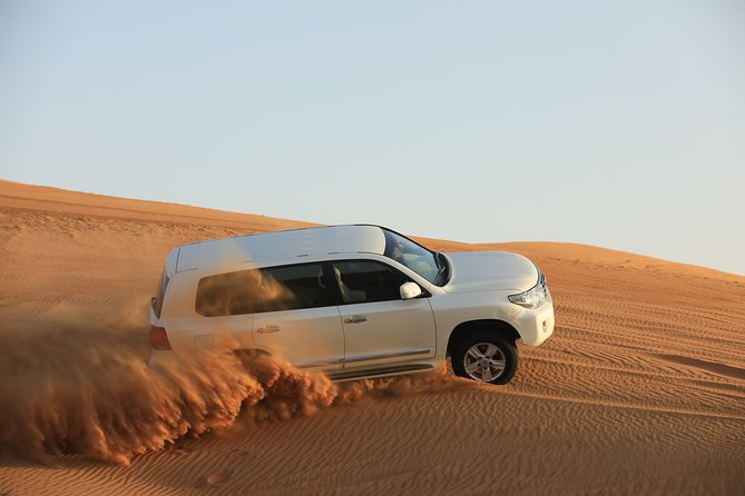 Dubai: Adventure Evening Desert Safari, Camel Ride, Shows & BBQ Dinner - Pickup and the long ride into the desert