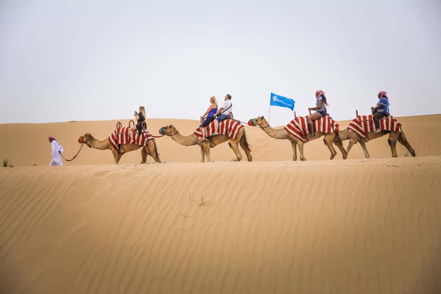 Dubai: Adventure Quad Bike Safari, Camel Ride & Refreshment - Guides, photos, and how the service affects the day