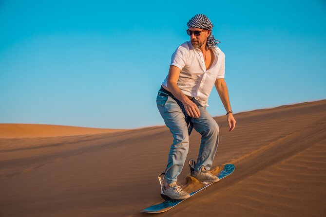 Dubai: Adventure Quad Bike Safari, Camel Ride & Refreshments - Sandboarding on the dunes