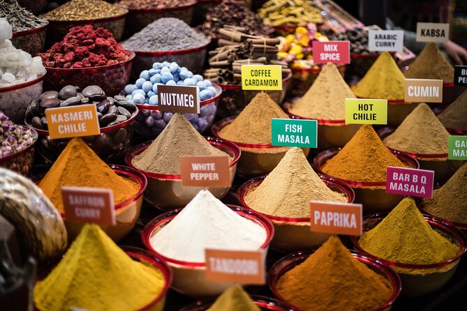 Dubai Aladdin Tour: Souks, Creek, Old Dubai and Tastings - Walking the wind-tower lanes of Al Fahidi