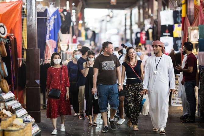 Dubai Aladdin Tour: Souks, Creek, Old Dubai and Tastings - Crossing Dubai Creek by private abra