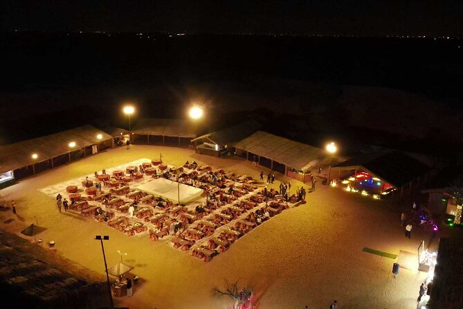 Dubai: Buggy Dune Bashing, Sand Boarding, Camel Ride & Show - Pickup from central Dubai and the ride to the dunes