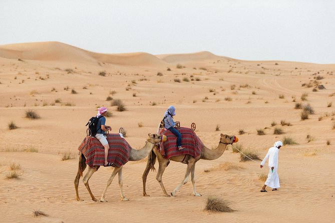 Dubai Camel Desert Safari, Traditional Meal & Heritage Activities - The 45-minute camel caravan across the dunes