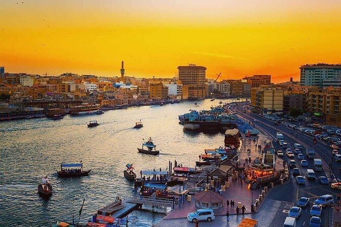 Dubai City Tour - The History from Riding Camel to Riding Ferrari - Crossing Dubai Creek by abra