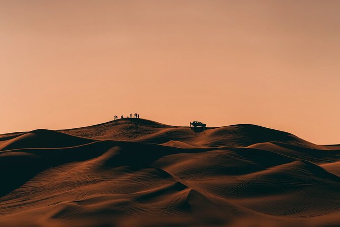 Dubai City Tour with Desert Safari, Camel Ride, Dune Bashing & BBQ - The campsite evening, from henna to fire show