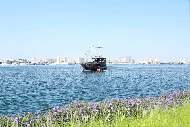 Dubai Creek Harbour Pirate Ship Sightseeing Dhow Cruise - Water, Drinks, and the Pizza Option