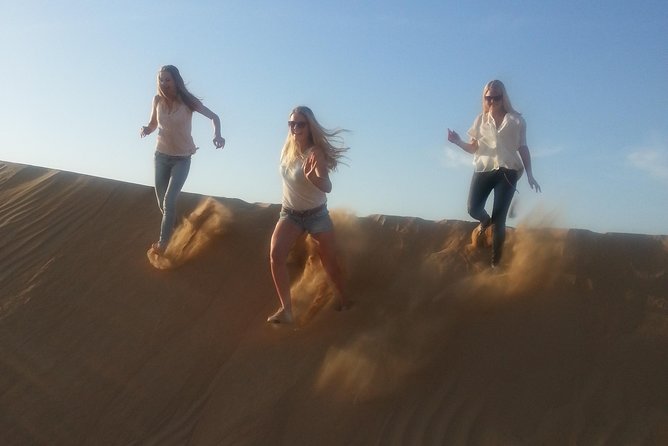 Dubai Desert Afternoon Quad Safari with Camel Ride, BBQ Dinner and Belly Dancing - Belly dancing and tanoura after dinner