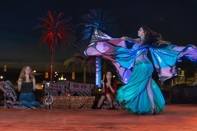 Dubai Desert Camp Dinner with BBQ, Dinner, Camel Ride & Shows - Catch the sunset before the camp fills up