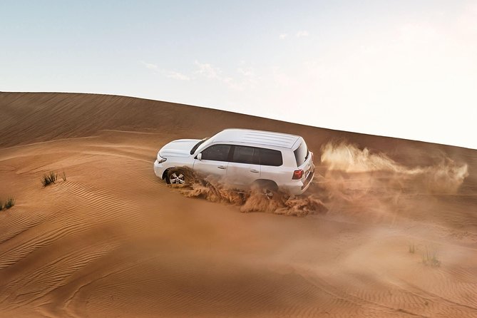 Dubai Desert Excursions with BBQ Dinner & Live Entertainment - Lahbab dune bashing is the main event