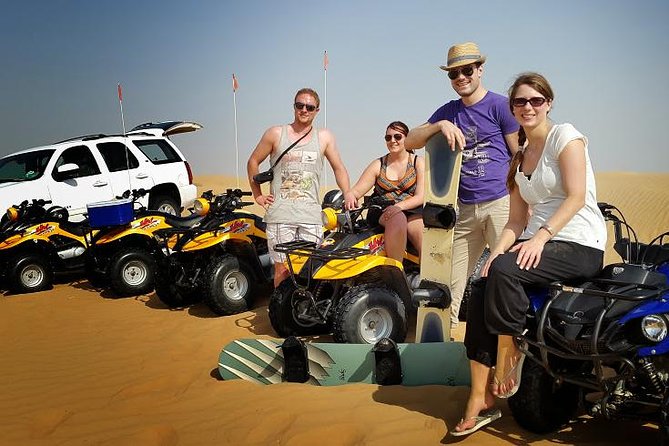 Dubai Desert Morning Tour in 4WD Vehicle: Camel Ride, Quad Bike Tour, Sandboarding, and Camel Farm - Guides, photos, and the human side