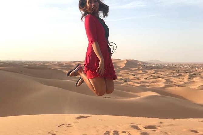 Dubai Desert Red Dune Half-Day Safari Adventure and BBQ Dinner - Belly dancing, tanoura, and fire shows after dark