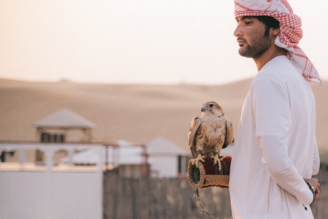 Dubai Desert Safari: 4x4 Dune Bashing, Camel Ride & BBQ Dinner - Tanaura, belly dance, and the fire show