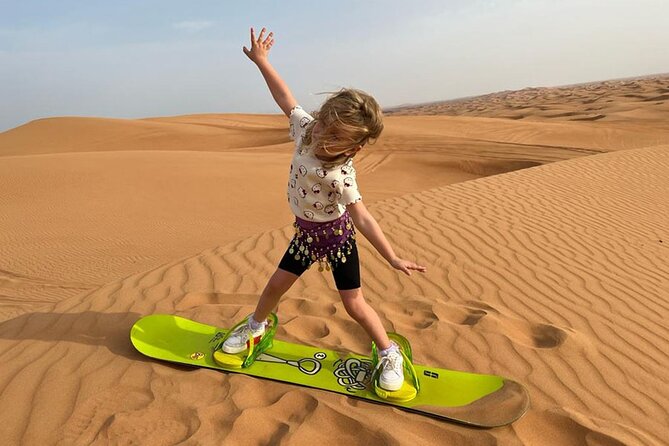 Dubai: Desert Safari 4x4 Dune with Camel Riding and Sandboarding - Sandboarding and sunset photographs