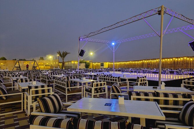 Dubai Desert Safari Adventure, Camel Ride, Sand surf, BBQ Dinner - Sandboarding and a Short Camel Ride