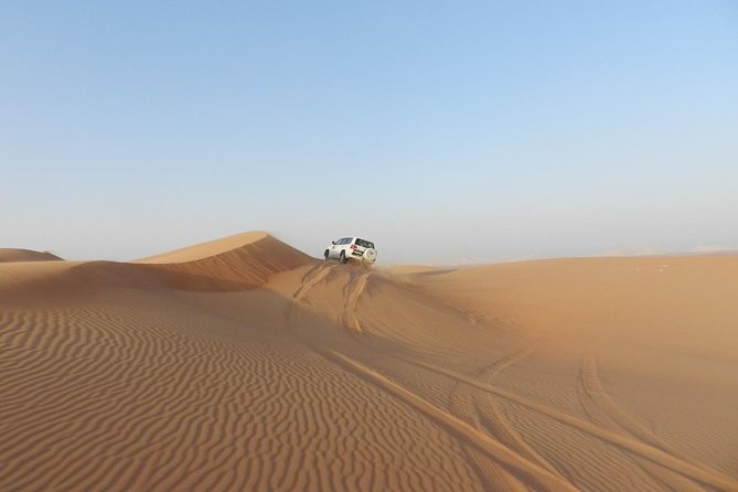 Dubai Desert Safari, ATV open desert, Camel ride, Shows & BBQ - ATV riding in the open desert