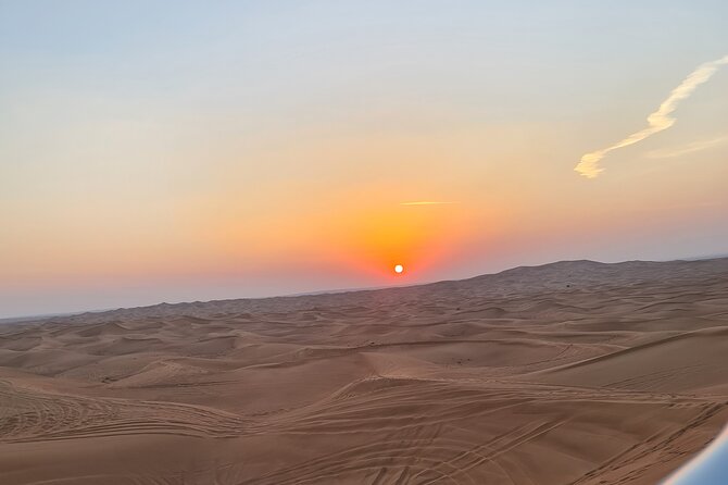 Dubai Desert Safari & Buffet Dinner and Camel ride with PRIVATE CAR - Belly dance, tanura, and fire shows