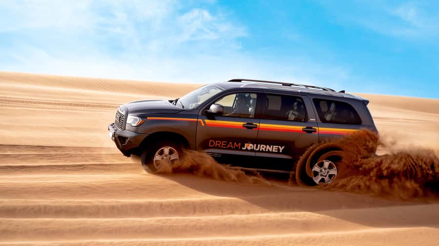Dubai Desert Safari - Camel Ride, Sandboarding & 30 Min Quad - The 50-minute drive from Dubai to Lahbab