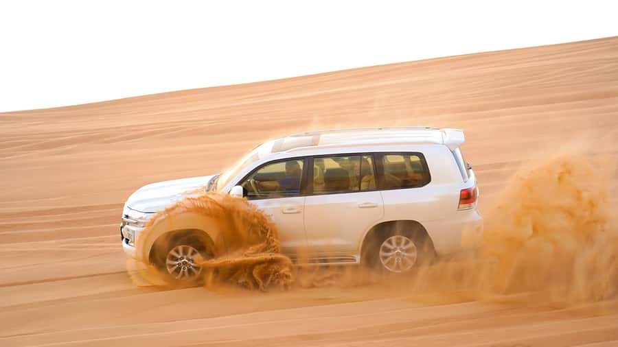 Dubai: Desert Safari, Camel Ride, Sandboarding, Quad Bike - The two-hour camp, BBQ, and evening show