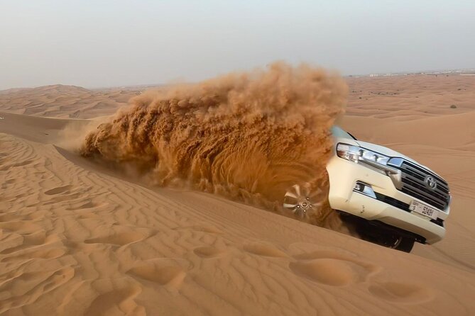 Dubai Desert Safari, Camel Ride, Shisha, Henna, Live BBQ & Shows - BBQ dinner, unlimited drinks, and three live shows