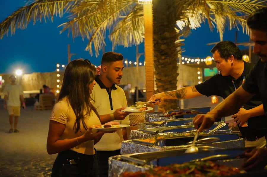 Dubai: Desert Safari, Camel Ride, Show & Optional Dinner - How the transport and group format affect the day