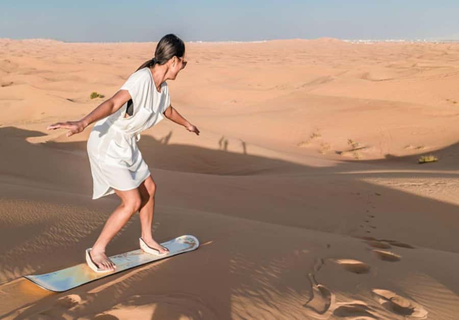 Dubai: Desert Safari Camel Riding, Sandboarding & BBQ Dinner - Tire pressure, falcons, and the optional quad-bike stop
