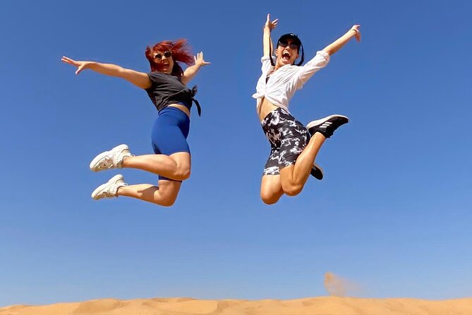 Dubai Desert Safari: Dune Bashing, Camel Ride & BBQ Dinner - Dune bashing across the red sand