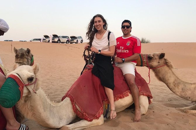 Dubai Desert Safari, Evening at Red-Dunes, 5<em> BBQ Dinner – Five things to know before you book’ /></p>
<ul>
<li><strong>The 3 p.m. start is built around sunset:</strong> You spend the afternoon reaching the Red Dunes, then watch the light soften before dinner and shows.</li>
<li><strong>Dune bashing is the main thrill:</strong> A fully air-conditioned 4×4 Land Cruiser takes you over the sand as part of the package.</li>
<li><strong>Buggy and ATV rides last 30 minutes:</strong> Single and double quad bikes, plus two-seat and four-seat buggies, are available at the adventure stop.</li>
<li><strong>The camp combines tradition and stage entertainment:</strong> Expect a short camel ride, henna, Arabic snacks, Tanoura, fire dancing, and belly dancing.</li>
<li><strong>The group can reach 200 people:</strong> That keeps the price reasonable but may mean a busy camp and less personal attention.</li>
<li><strong>The $134 price covers a full evening:</strong> Pickup, food, nonalcoholic drinks, activities listed as included, and entertainment are bundled together.</li>
</ul>
<h2 id="what-this-dubai-safari-is-really-offering">What this Dubai safari is really offering</h2>
<p><img width="668" height="446" decoding="async" src=