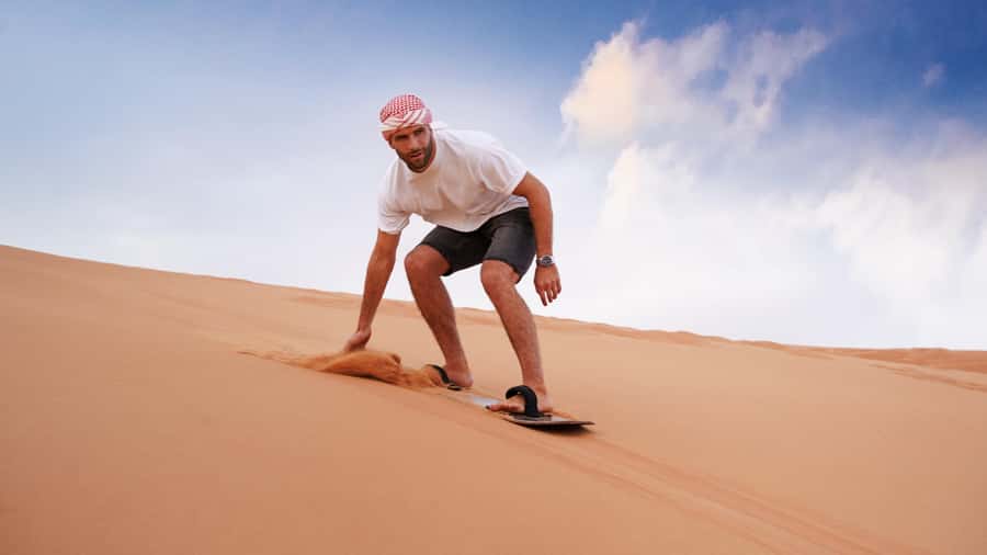 Dubai Desert Safari - Premium BBQ Dinner, Camel Ride & Shows - Sunset and the Bedouin-style camp