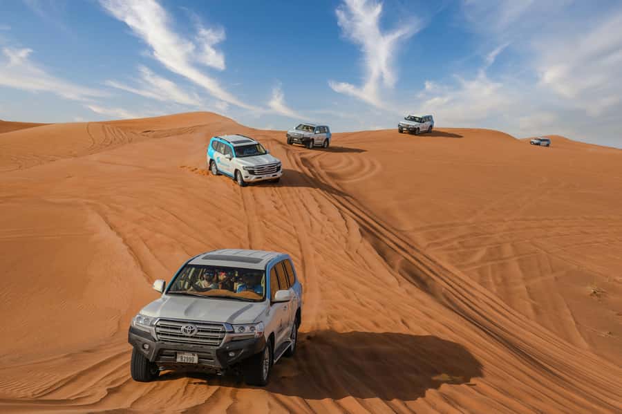 Dubai: Desert Safari, Quad Bike, Camel Ride & Al Khayma Camp - A short camel ride with a slower pace