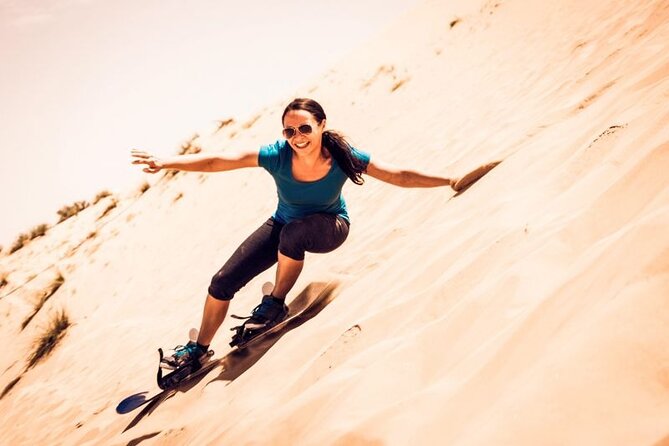 Dubai Desert Safari: Quad Bike, Camel Ride and BBQ Dinner - Dune bashing in a Land Cruiser
