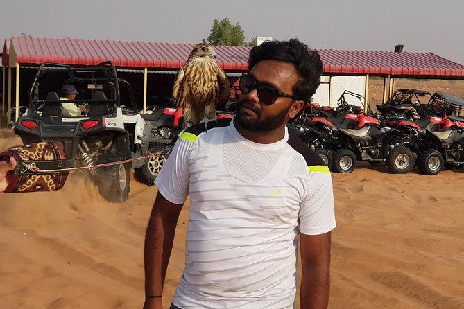 Dubai Desert Safari, Quad Bike, Camel Ride, and Buffet Dinner - Belly dancing, Tanura, and fire performances