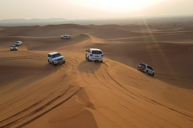 Dubai Desert Safari, Quad Bike, Camel Ride, and Buffet Dinner - What to know before you book