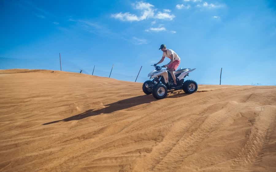 Dubai: Desert Safari, Quad Bike, Camel Ride and Sandboarding - Sandboarding and the best photo stop