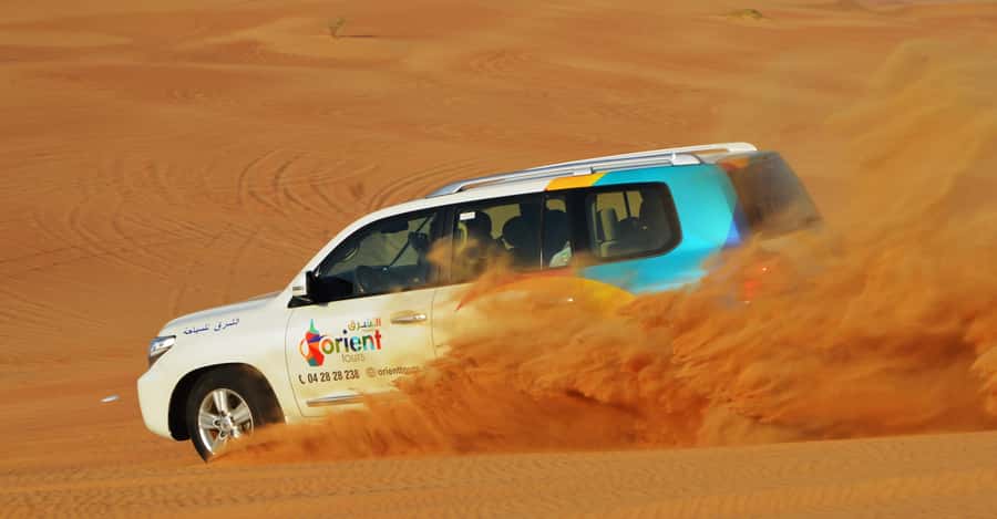 Dubai Desert Safari, Quad Biking, Camel Ride, & Sandboarding - From Dubai Hotels to the Lahbab Desert