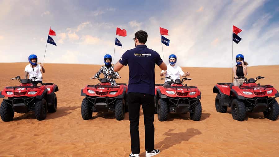 Dubai Desert Safari - Sandboarding, Quad Bike & BBQ Options - Sunset views, photos, and the short camel ride