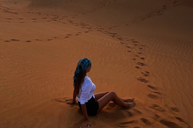 Dubai Desert Safari: Tanoura Show, Dune Bashing and BBQ Dinner - Leaving Dubai for the red dunes