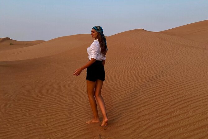 Dubai Desert Safari: Tanoura Show, Dune Bashing and BBQ Dinner - Sandboarding, camels and the first taste of camp life