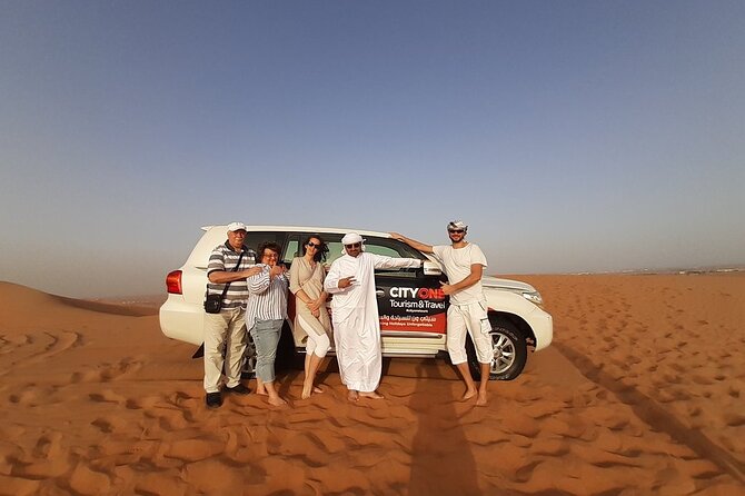Dubai Desert Safari: Tanoura Show, Dune Bashing and BBQ Dinner - Tanoura dancing and belly dancing after dark