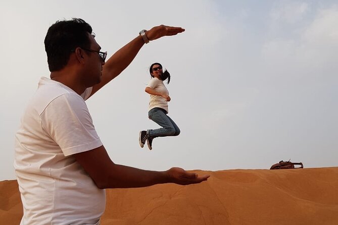 Dubai Desert Safari: Tanoura Show, Dune Bashing and BBQ Dinner - Dune bashing and desert sunset photographs