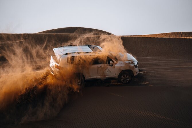 Dubai Desert Safari Thrill: Camel Ride, Live shows, BBQ & Spirits - Arabic coffee, dates, and the Bedouin camp