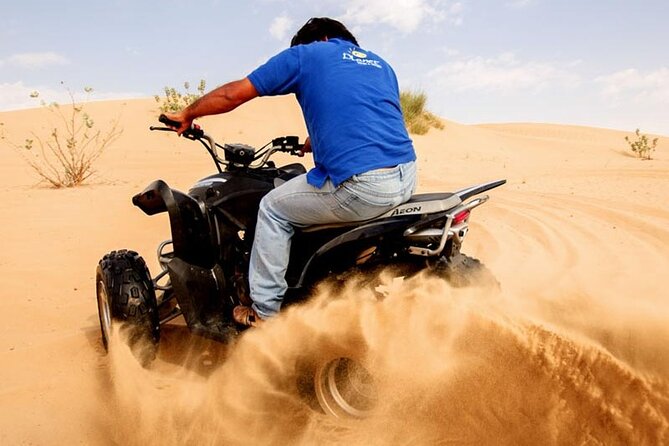 Dubai Desert Safari Tour with Quad Bike for 60mins & BBQ Dinner. - Dune bashing in a Land Cruiser