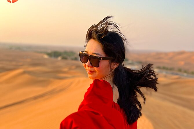 Dubai desert safari with 4x4 Dune Bashing,Camel Ride sand board - Sandboarding and Sunset Photos